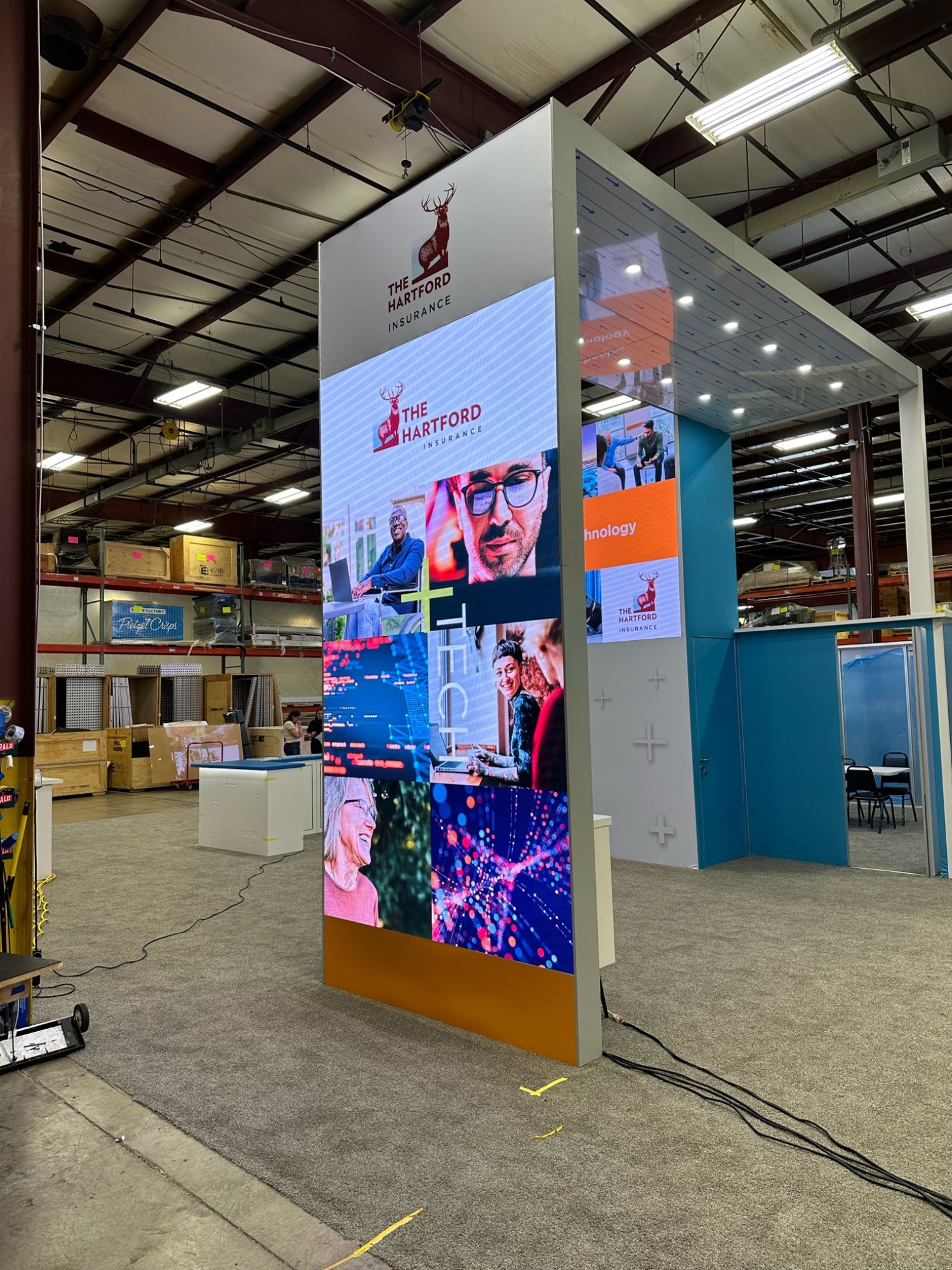 A tall Hartford event display showing a grid of video imagery